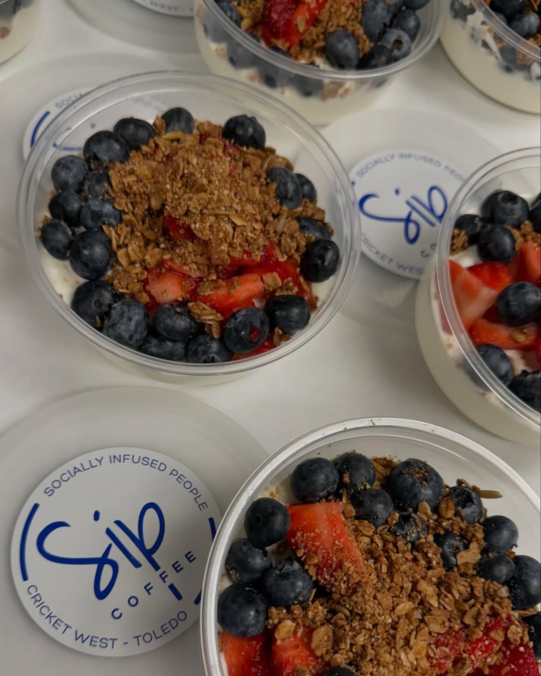 SIP Coffee yogurt parfait with berries and granola